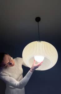 ONION Soft Ivory color Pendant Light Shade in hands bottom Person installing elegant pendant light