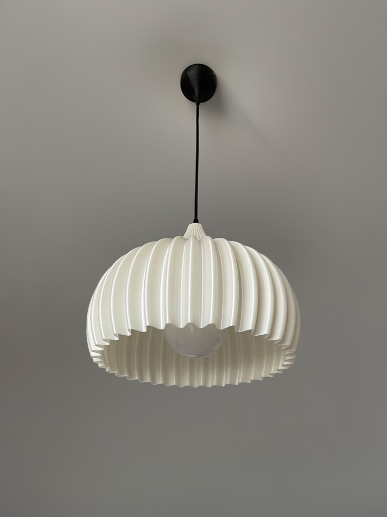 G125 globe bulb paired with a large printed lampshade