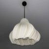 Woman holding elegant pendant light