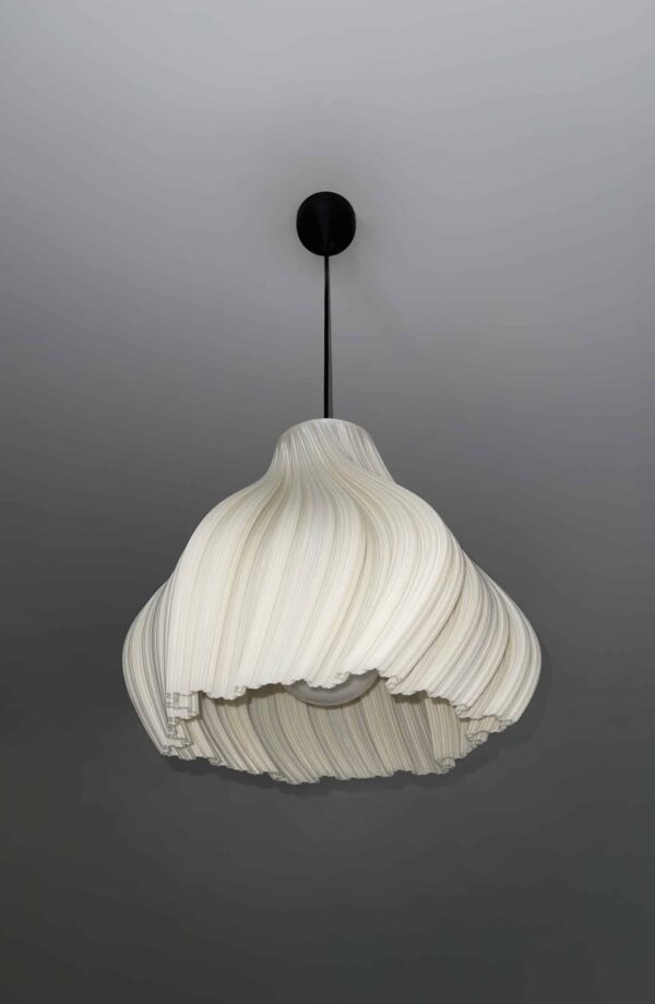 Woman holding elegant pendant light