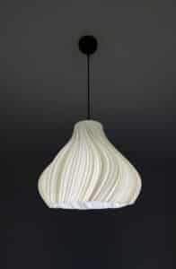 Elegant pendant light with swirling design