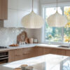 Person holding a soft ivory pendant light