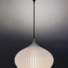 Elegant ivory pendant light fixture.
