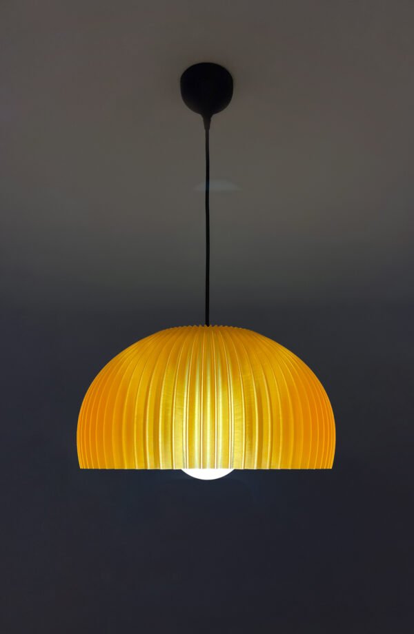 DOME Warm Amber Pendant Lamp Shade with light on side view DOME Warm Amber Pendant Lamp Shade